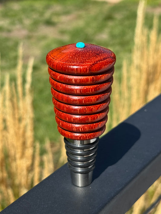 #173 - Padauk Whiskey Bottle Stopper with Sleeping Beauty Turquoise Cabochon