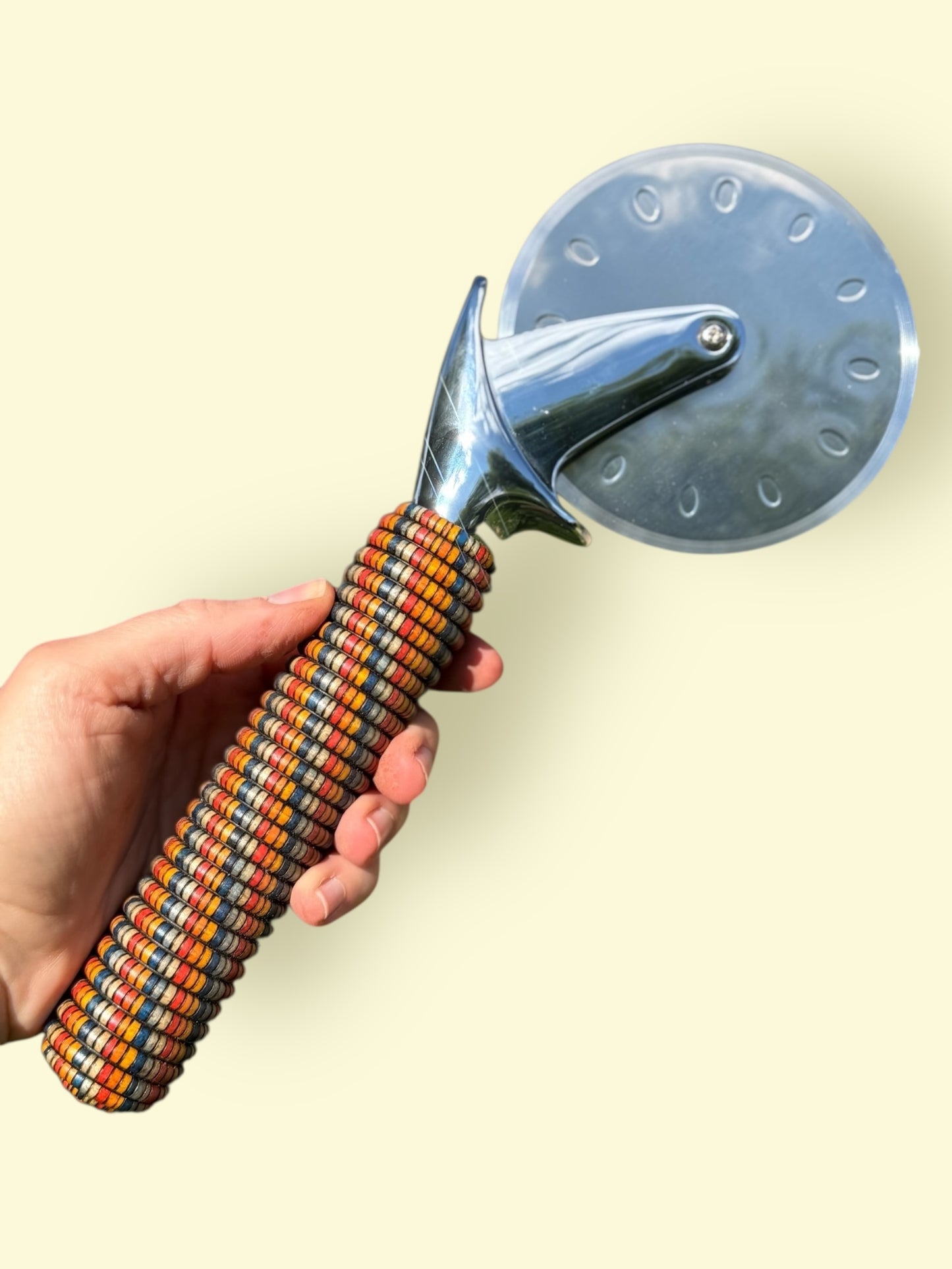 #99 - Basket Illusion Pizza Cutter with Coral Cabochon